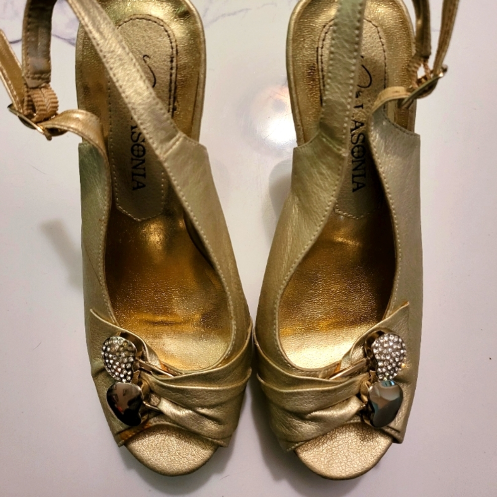 Gold high heel shoes